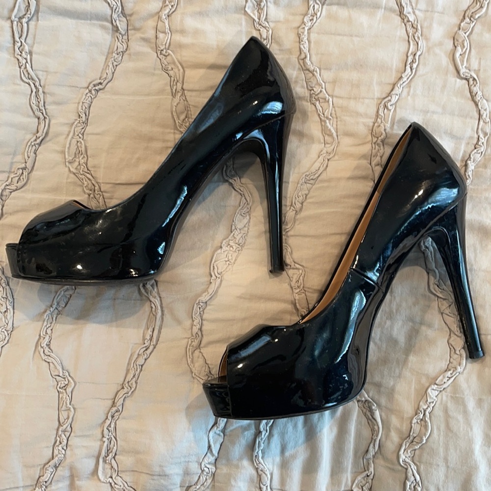 Black patent leather Guess heels.